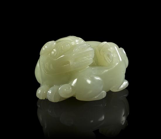 A White Jade Carving of a Lion 154301