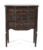 A French Oak Carved Chest having a shaped
