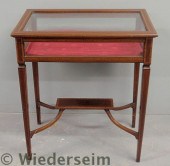 Inlaid mahogany curio table with tapered