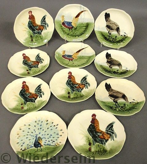 Set of eleven French ceramic bird plates