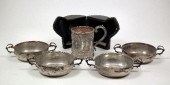 A set of four George V silver circular 15c235