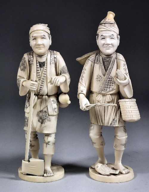 A pair of Japanese carved ivory 15c3a2