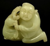 A Chinese pale green carved jade 15cd52