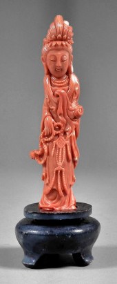 A good Chinese carved red coral standing