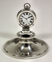 A George V silver capstan pattern combined