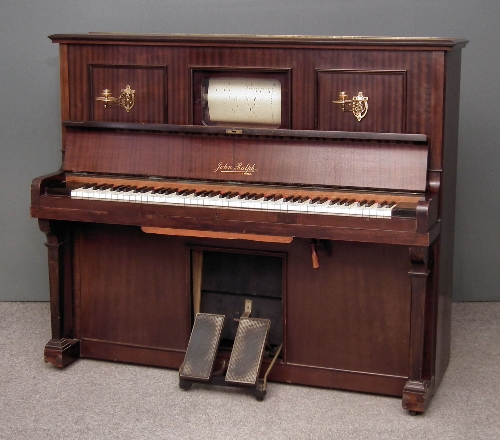 An early 20th Century upright pianola