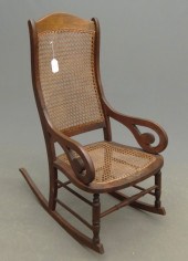 Victorian Lincoln rocker with cane seat