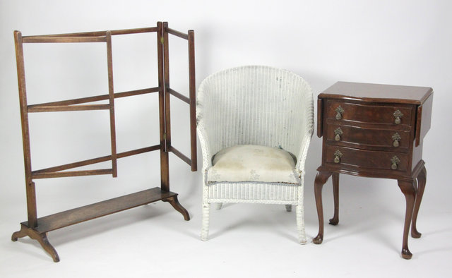 A Lloyd Loom type armchair a two flap 163373