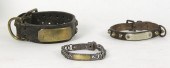A dog collar with brass plaque J.A.