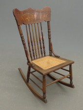 Victorian oak cane seat pressed back