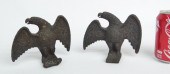 Lot two early cast iron snow eagles.