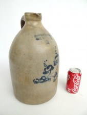 19th c. stoneware jug with floral decoration
