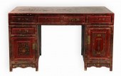 A Chinese red lacquer pedestal writing