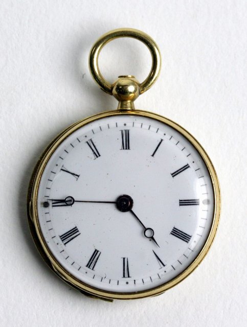 A miniature gold and enamel watch the inner