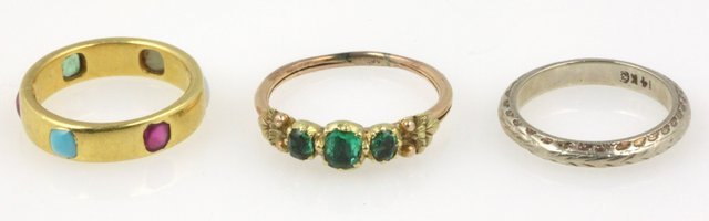 A multi gem set ring in an unhallmarked 16498b