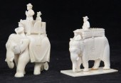Two Indian ivory elephants with howdah