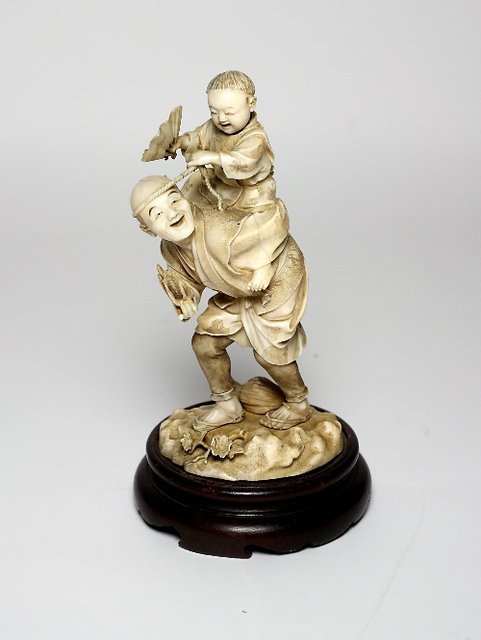 A Japanese carved ivory Okimono 168990