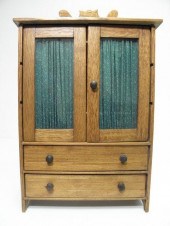 Antique wooden miniature wardrobe cabinet.