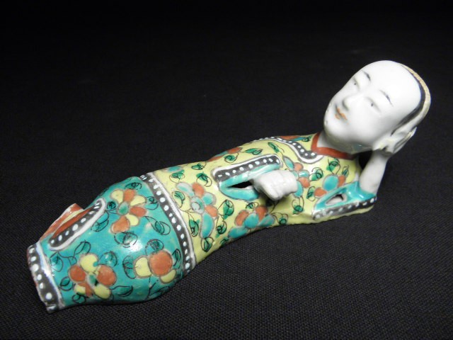 Chinese porcelain figure of a reclining