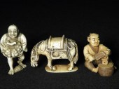 Three Japanese carved ivory netsuke.