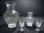Two Waterford cut crystal vases of various