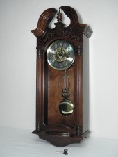 Howard Miller Mahogany cased wall clock.