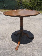 Wooden tilt-top pie crust table. Latch