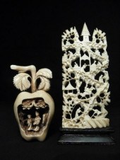 A Chinese carved ivory apple with interior