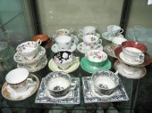 Lot of assorted porcelain cups & saucers.
