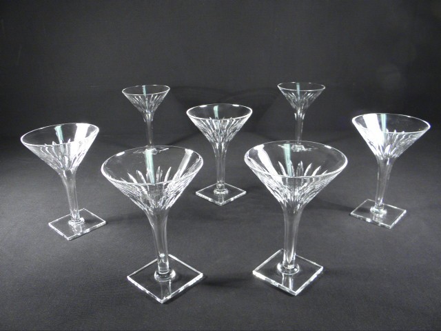 Seven contemporary style Hawks cut crystal