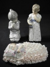 Lot of three assorted porcelain figurines.