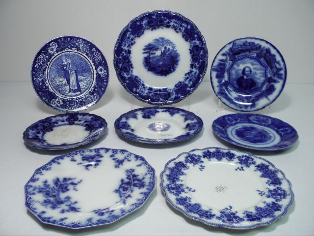 Lot of eight assorted flow blue plates. Includes