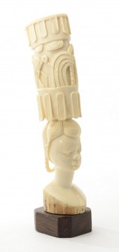 AN AFRICAN ELEPHANT IVORY CARVING consisting