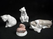 Lot of four porcelain figurines. Includes