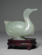 A Chinese carved green Nephrite jade