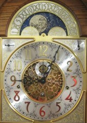 AN OAK TALL CASE FLOOR CLOCK Sligh Clock