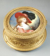 FRENCH ROUND JEWELRY BOX in gilt metal.