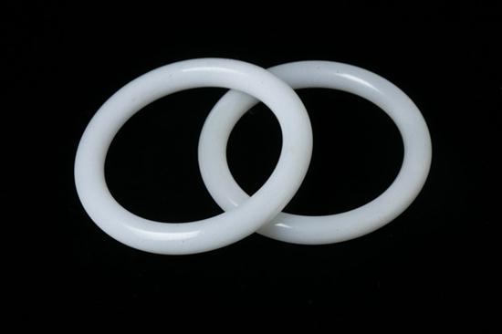 TWO CHINESE WHITE JADE BANGLES. - 3 3/8 in.