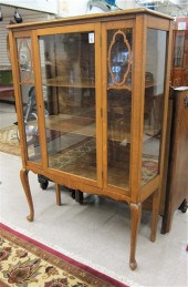 AN OAK QUEEN ANNE REVIVAL CHINA CABINET