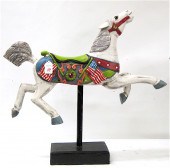 AN AMERICAN CAROUSEL CARVED WOODEN HORSE