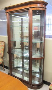 HARDWOOD AND CURVED GLASS CURIO CABINET