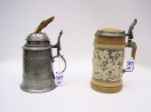 TWO COLLECTIBLE GERMAN BEER STEINS: