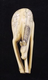 A large Japanese ivory netsuke of a