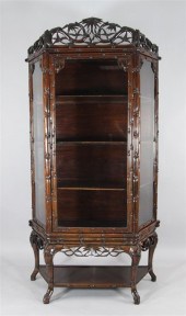 A Chinese carved hardwood display cabinet