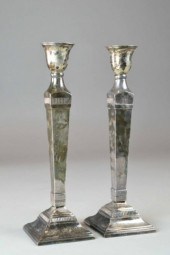 A PAIR OF SILVER PLATED CANDLESTICKSA 17117c