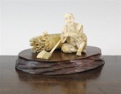 A good Japanese ivory figure of 17128a