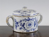 A Delft blue and white pot and cover