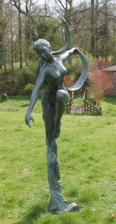 A modern bronze garden statue modelled