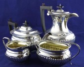 A George V demi fluted silver 4 piece