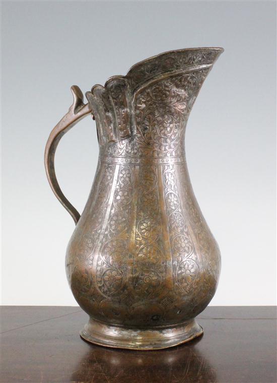 An Islamic tinned copper ewer 17th 1738a5
